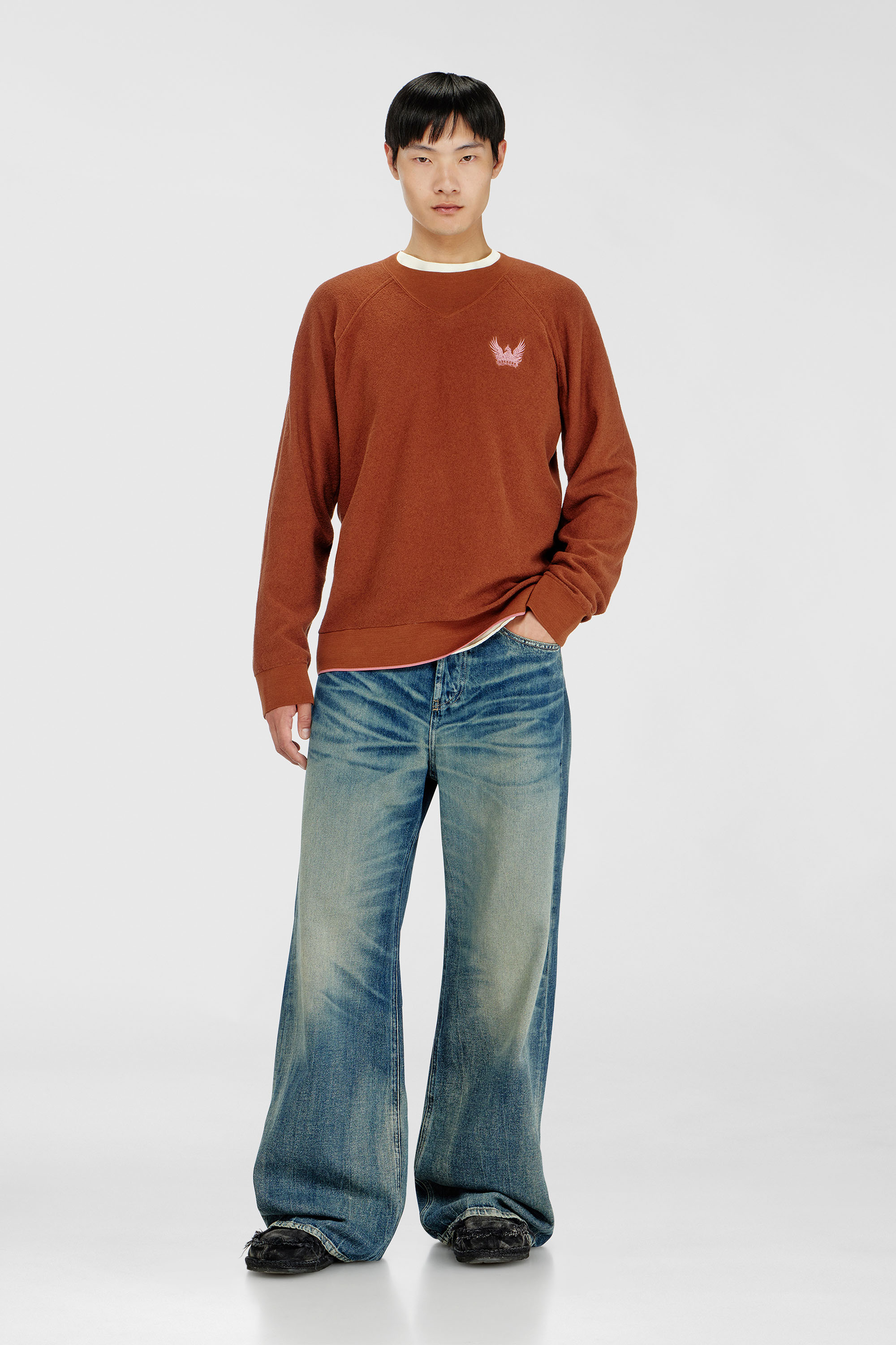 Boucl&eacute; jumper with Phoenix embroidery